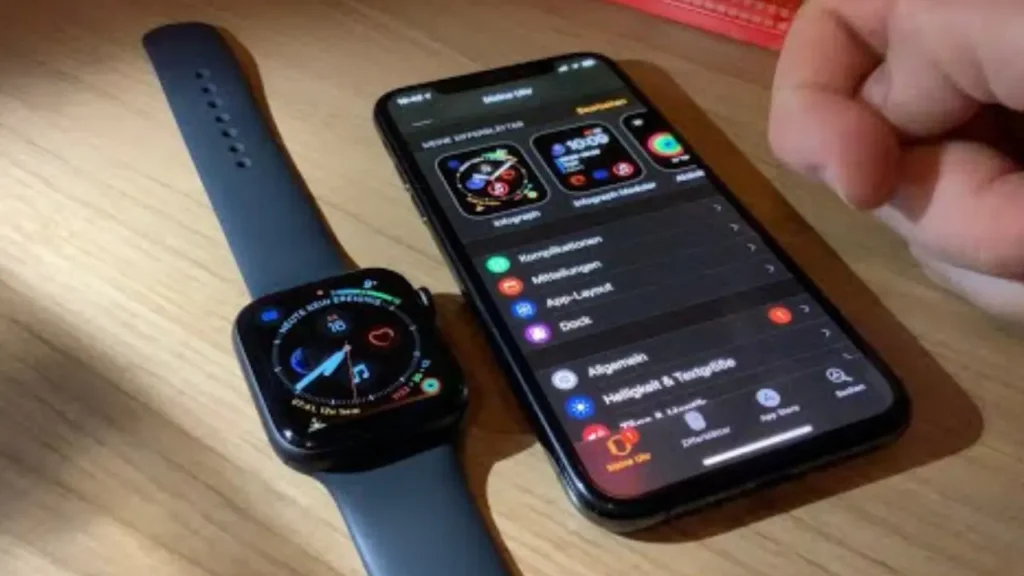 An Apple Watch Next to an iPhone Showing the Watch App Interface - How To Change Apple Watch Face?